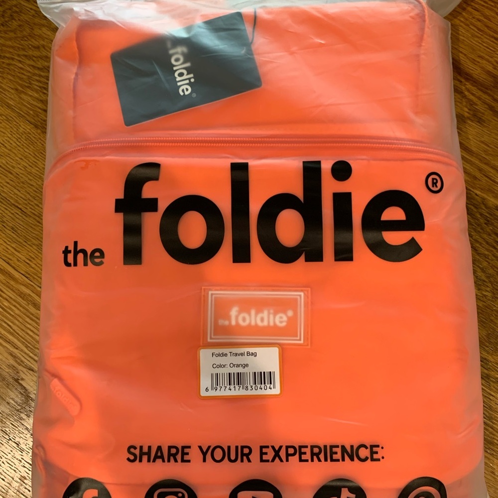 Orange Travel Bag with Flexible Material